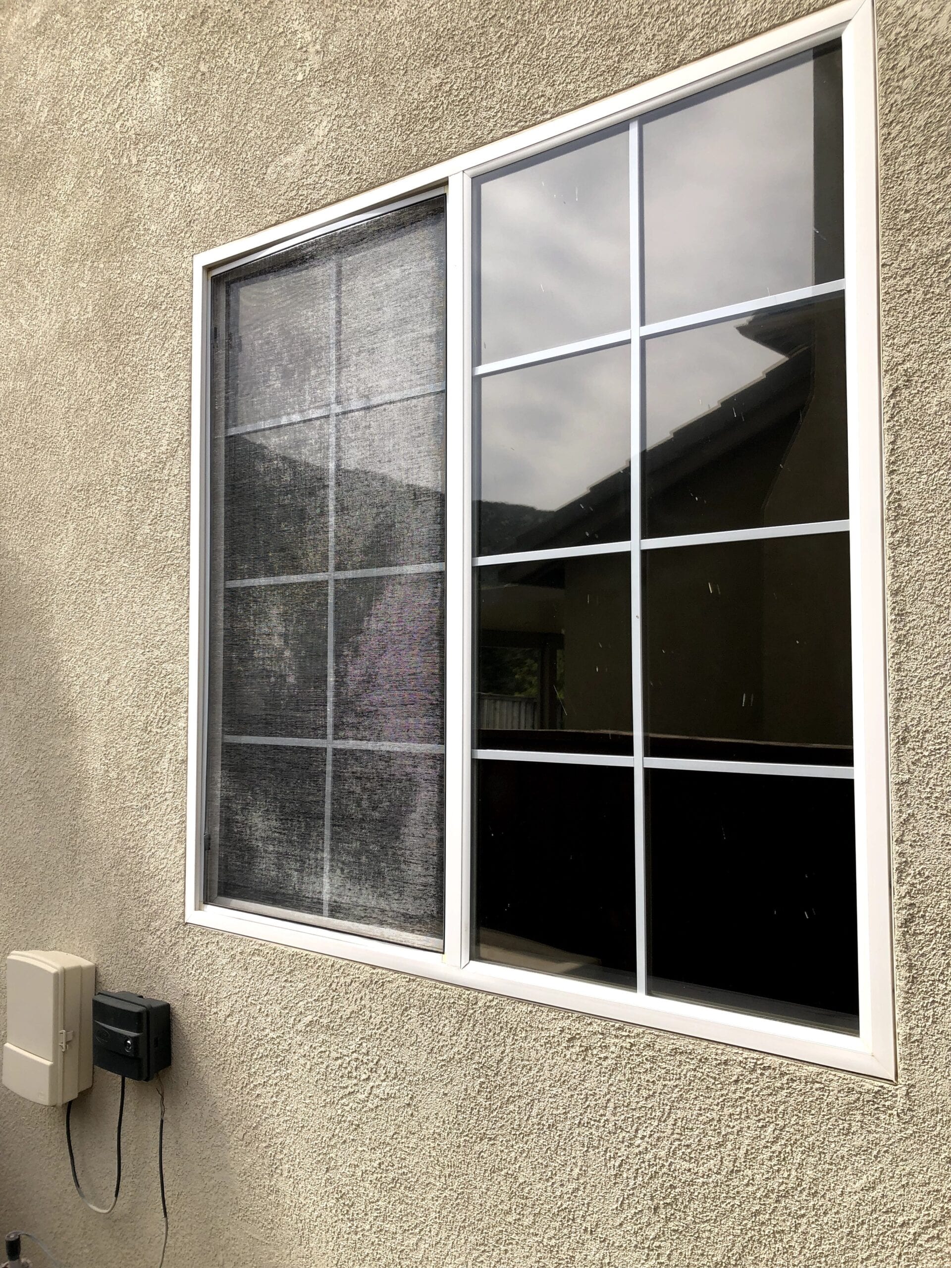 Dual Reflective Window film installation on a home in murrieta ca | Home window tinting murrieta 