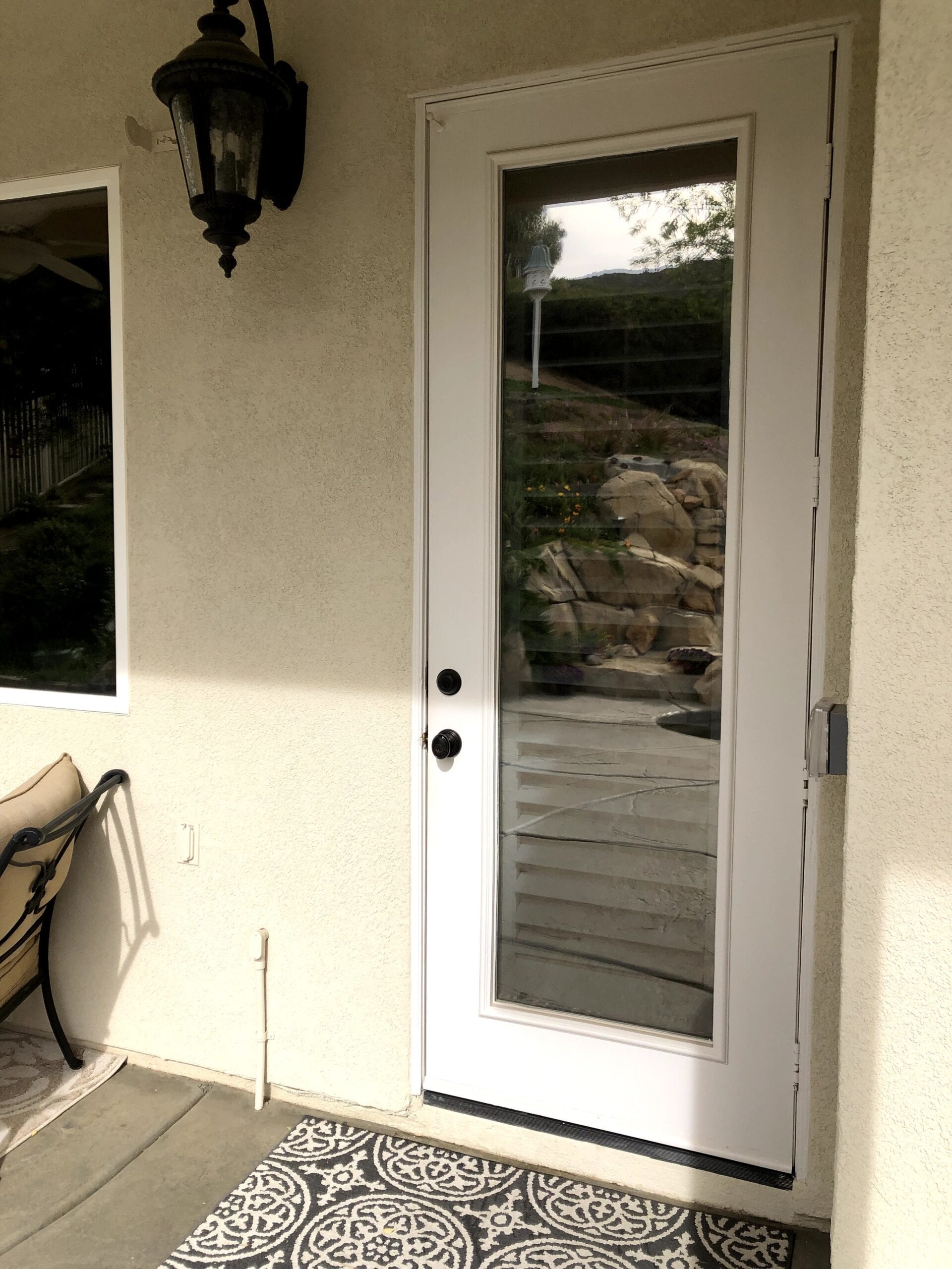 After installing a dual reflective film in Murrieta on a door